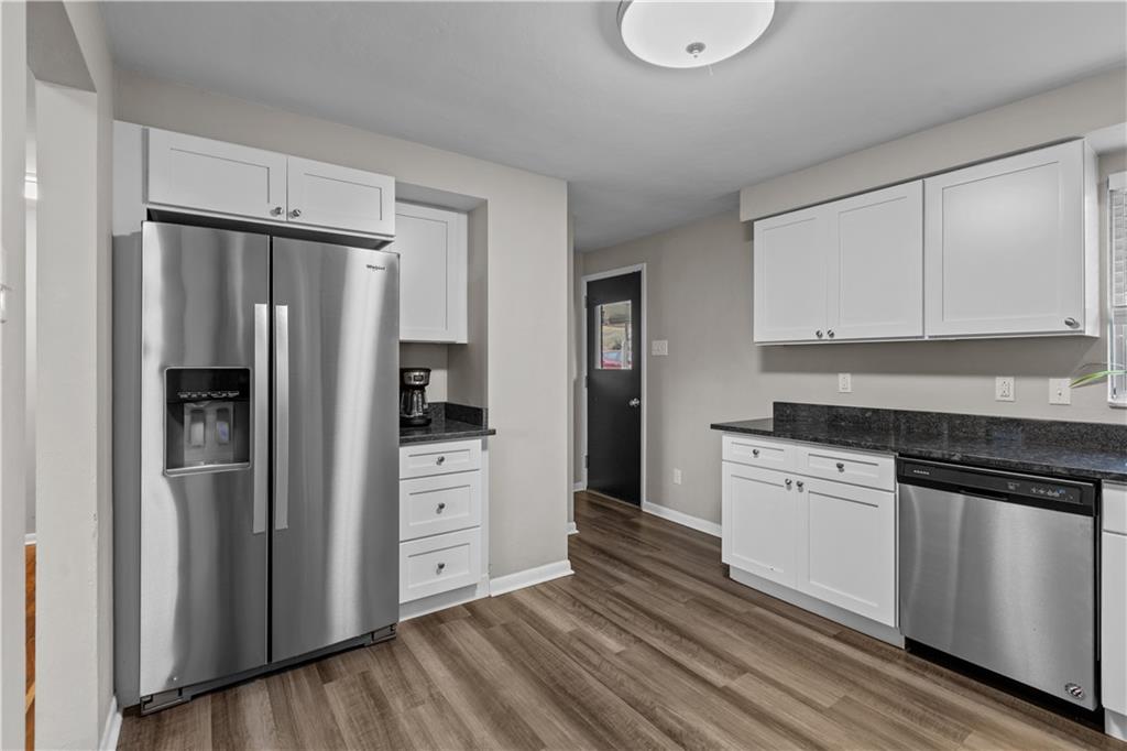 3407 Brighton Road Pittsburgh, PA 15212 - Photo 15 of 27 a kitchen with stainless steel appliances a refrigerator sink and microwave