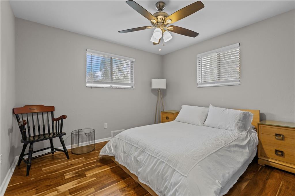 3407 Brighton Road Pittsburgh, PA 15212 - Photo 20 of 27 a bedroom with a bed and a table