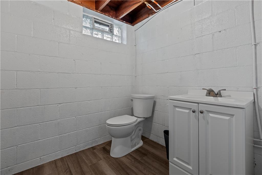 3407 Brighton Road Pittsburgh, PA 15212 - Photo 25 of 27 a bathroom with a toilet and a sink