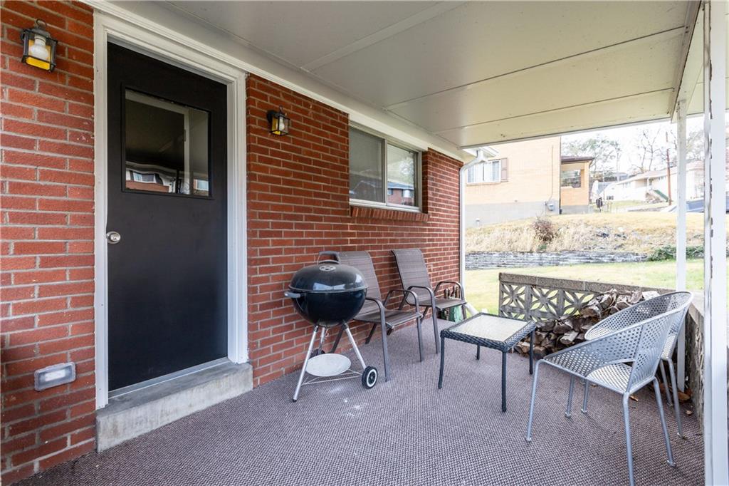 3407 Brighton Road Pittsburgh, PA 15212 - Photo 4 of 27 a balcony with chairs and with an outdoor space