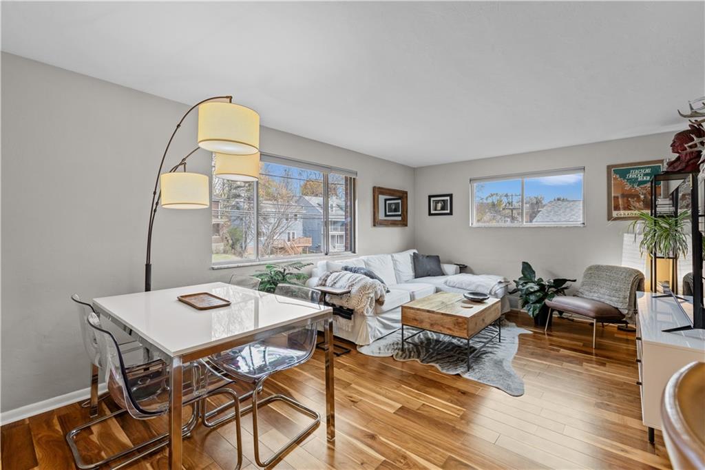 3407 Brighton Road Pittsburgh, PA 15212 - Photo 7 of 27 a living room with furniture and wooden floor