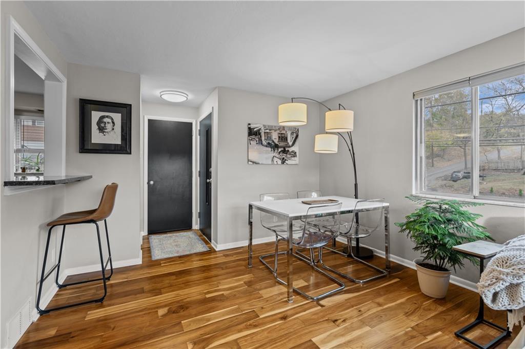3407 Brighton Road Pittsburgh, PA 15212 - Photo 9 of 27 a view of a livingroom with furniture and a window