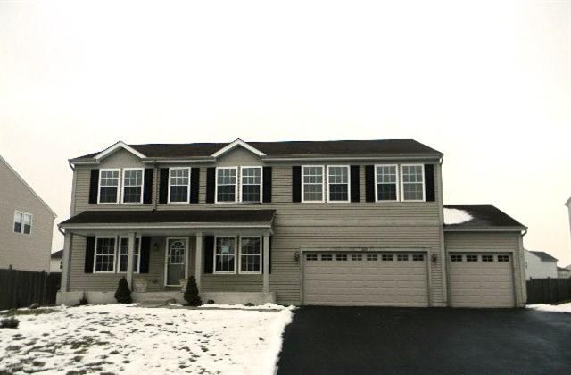 224 Ridgestone Trail Poplar Grove, IL 61065 - Photo 1 of 17 a view of a house with a wooden fence