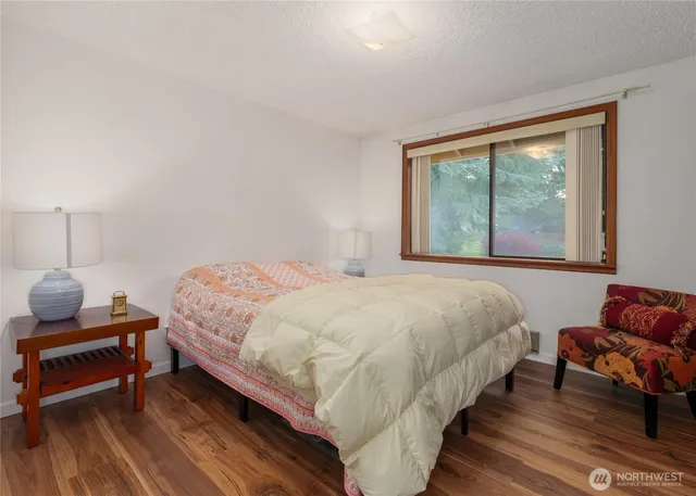 a view of a house with backyard and porch