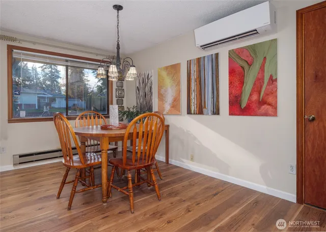 a view of balcony with wooden floor and fence