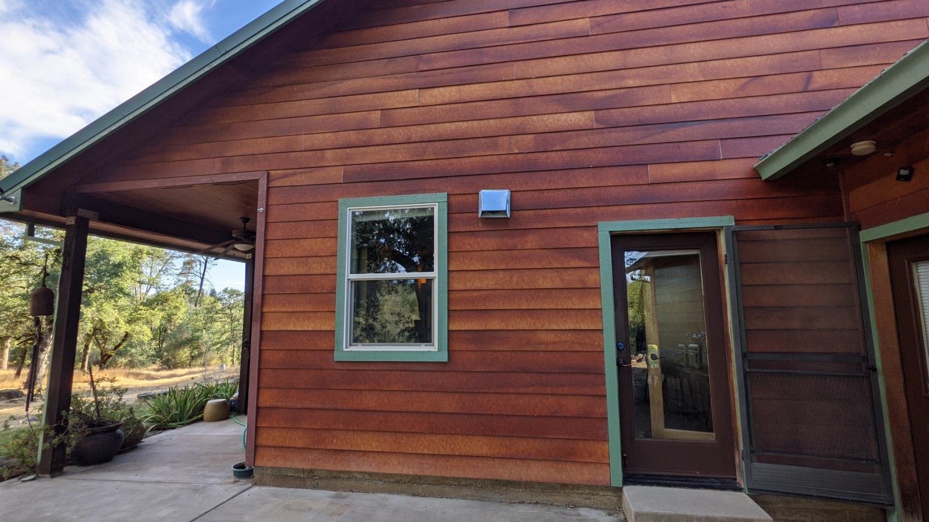 27203 Donkey Mine Road Oak Run, CA 96069 - Photo 18 of 22 a front view of a house with a garden