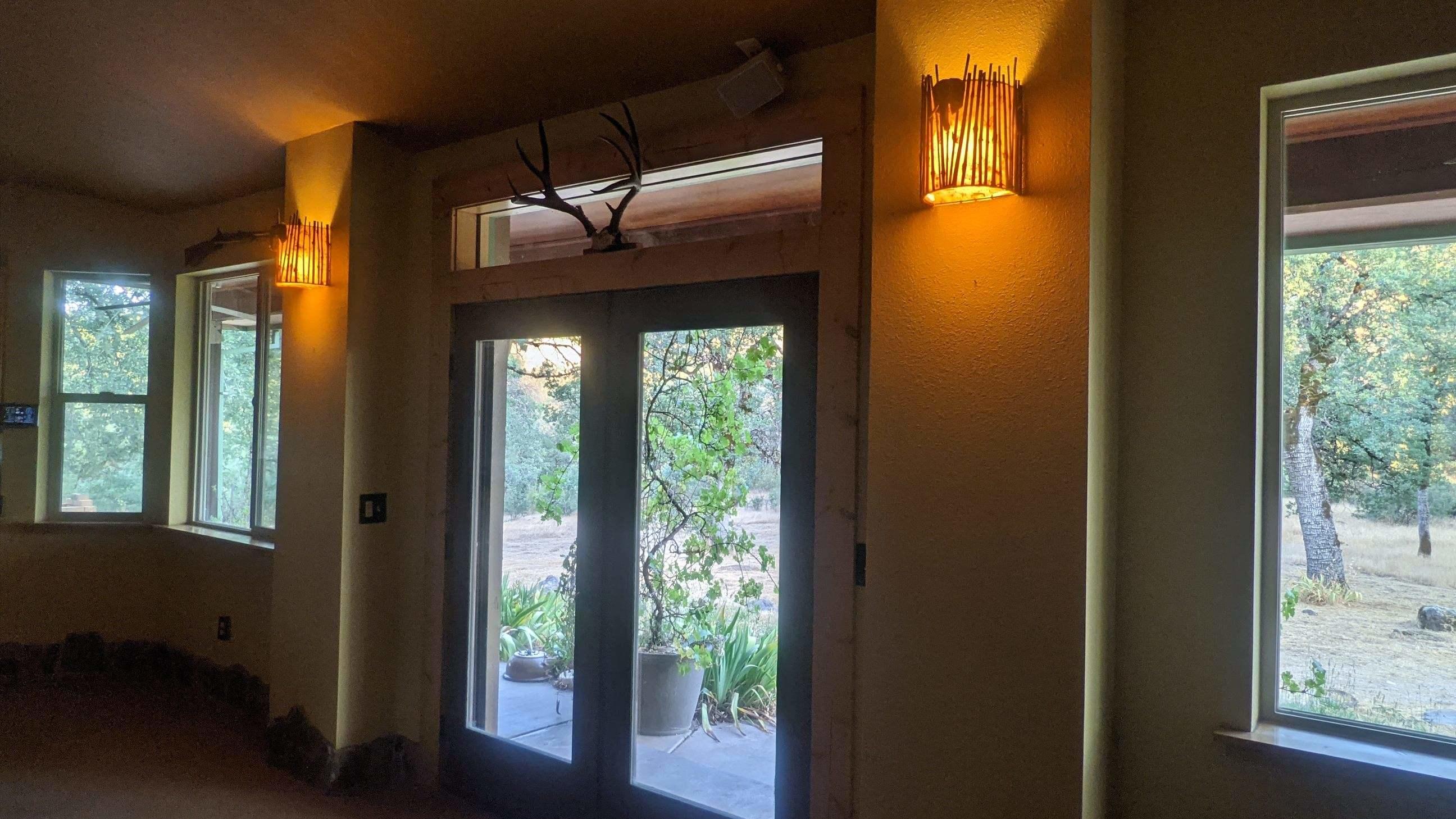 27203 Donkey Mine Road Oak Run, CA 96069 - Photo 4 of 22 a view of staircase with wooden floor and door