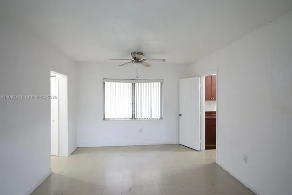 an empty room that has a window