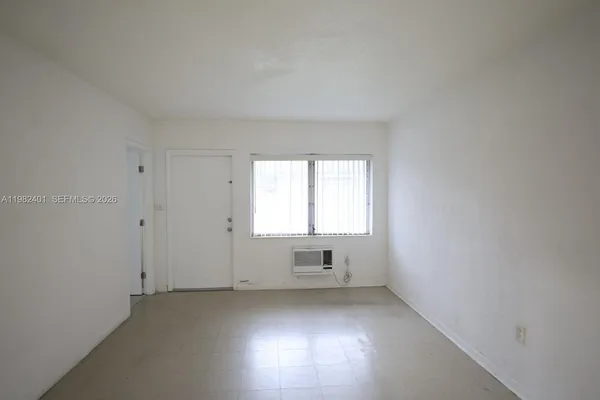 an empty room with a window