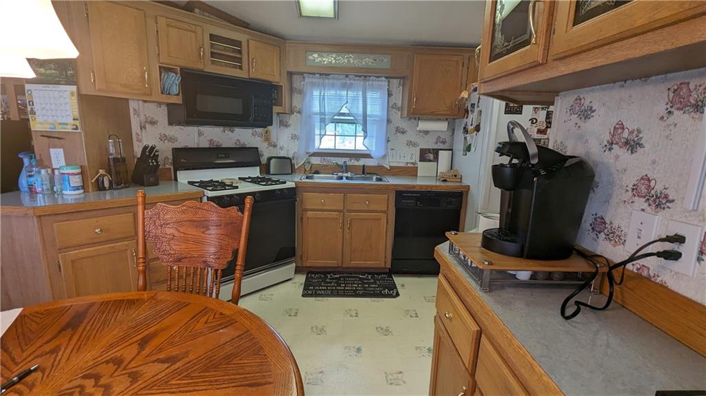 542 Finks Run Road McDonald, PA 15057 - Photo 14 of 28 a kitchen with a sink appliances and cabinets