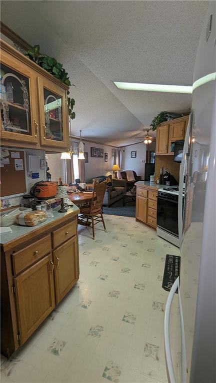 542 Finks Run Road McDonald, PA 15057 - Photo 16 of 28 a kitchen with stainless steel appliances granite countertop a sink stove and refrigerator