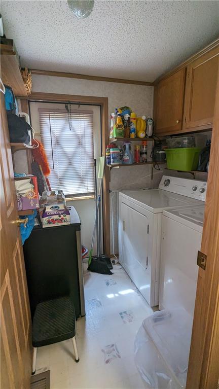542 Finks Run Road McDonald, PA 15057 - Photo 20 of 28 a kitchen with stainless steel appliances a stove a refrigerator a sink a stove and white cabinets