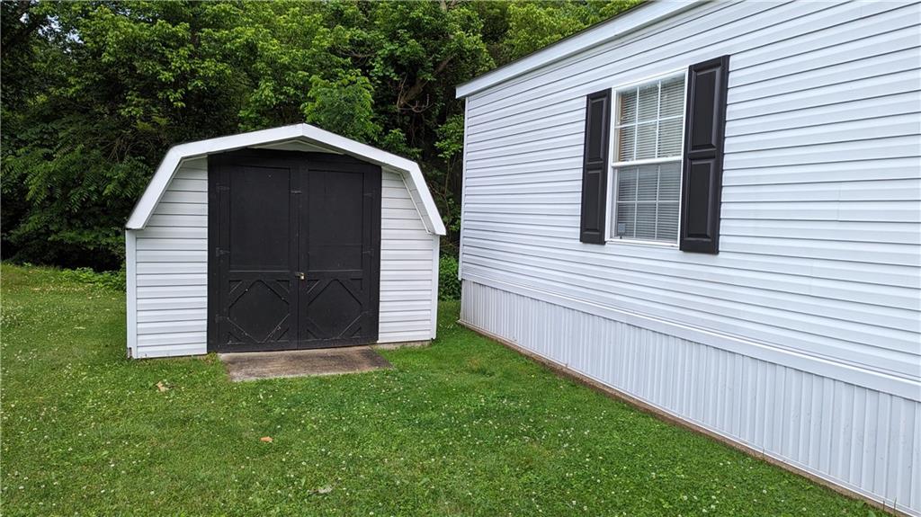 542 Finks Run Road McDonald, PA 15057 - Photo 5 of 28 a view of wooden house with a yard