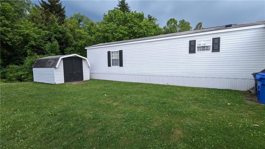 542 Finks Run Road McDonald, PA 15057 - Photo 6 of 28 a view of a backyard with plants and a garden