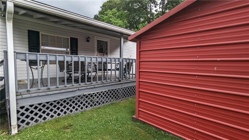 542 Finks Run Road McDonald, PA 15057 - Photo 7 of 28 a view of a house with a small yard and wooden fence