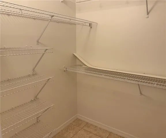 a view of a room with racks on the wall