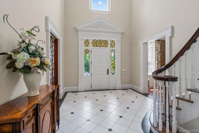 a view of entryway with wooden floor