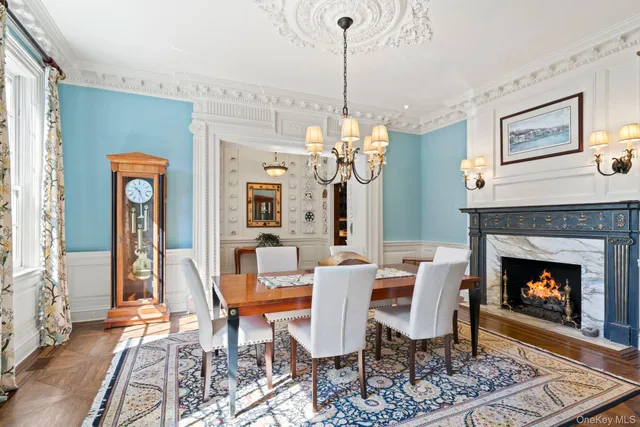 a view of a livingroom with furniture and a fireplace