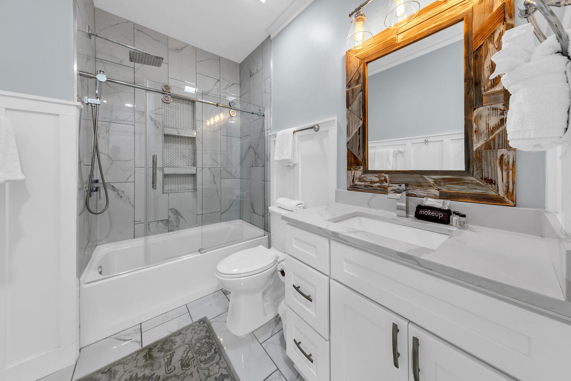 3604 East County Highway 30A, Unit B8 Santa Rosa Beach, FL 32459 - Photo 14 of 39 a bathroom with a sink a toilet and shower