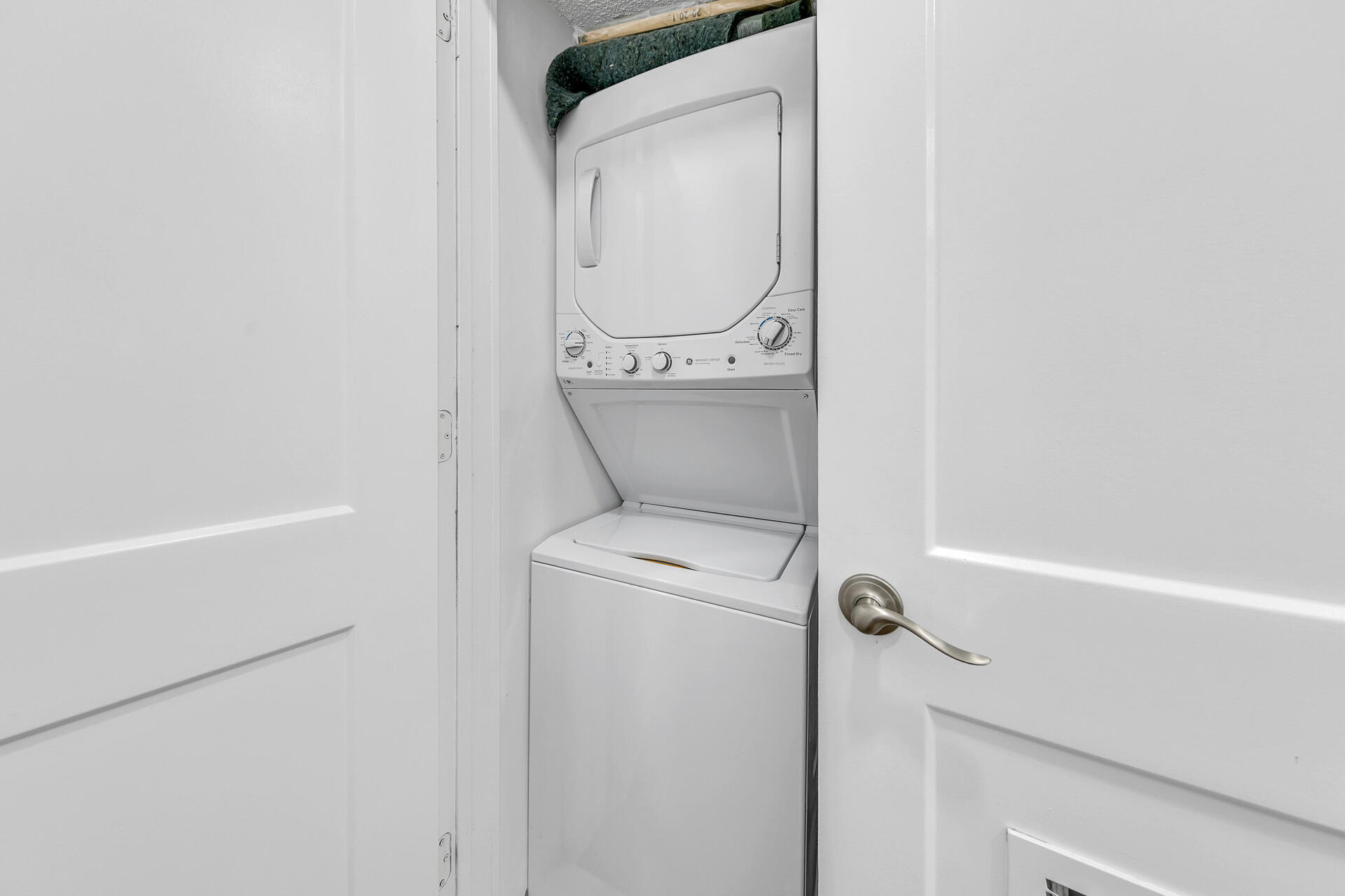 3604 East County Highway 30A, Unit B8 Santa Rosa Beach, FL 32459 - Photo 15 of 39 a close up of a washer and dryer