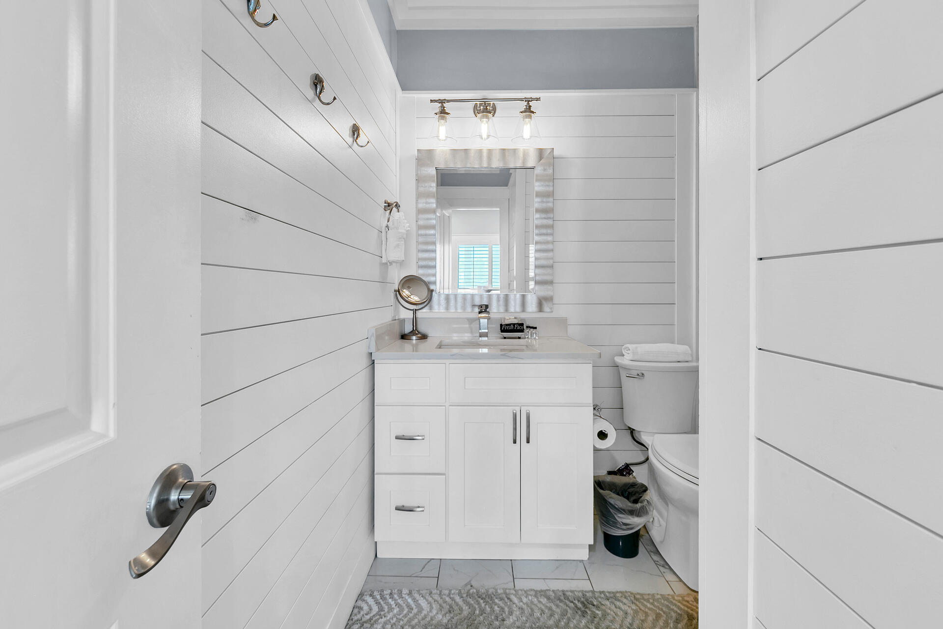 3604 East County Highway 30A, Unit B8 Santa Rosa Beach, FL 32459 - Photo 18 of 39 a bathroom with a sink and a mirror