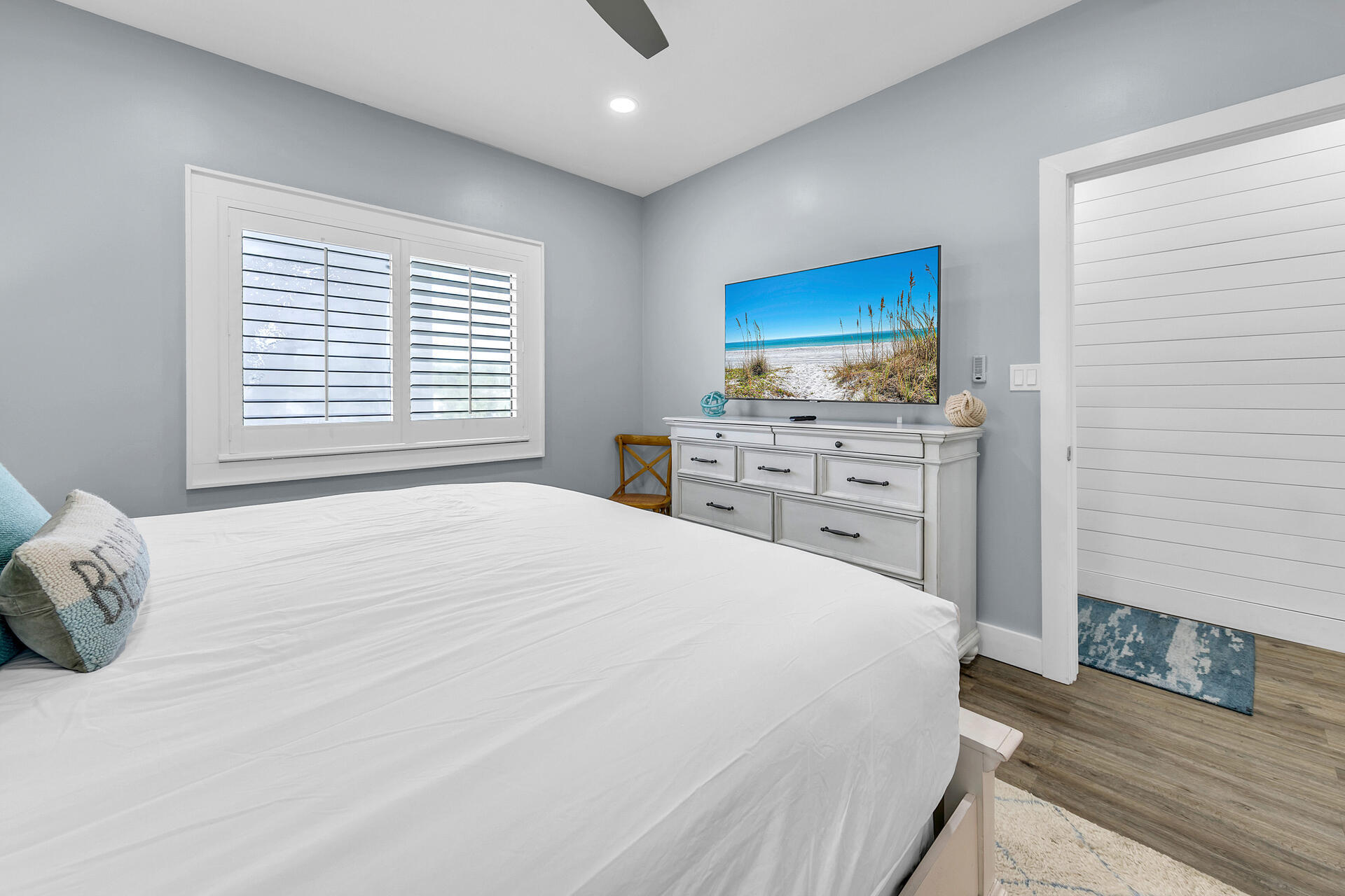 3604 East County Highway 30A, Unit B8 Santa Rosa Beach, FL 32459 - Photo 19 of 39 a bedroom with a bed and a dresser