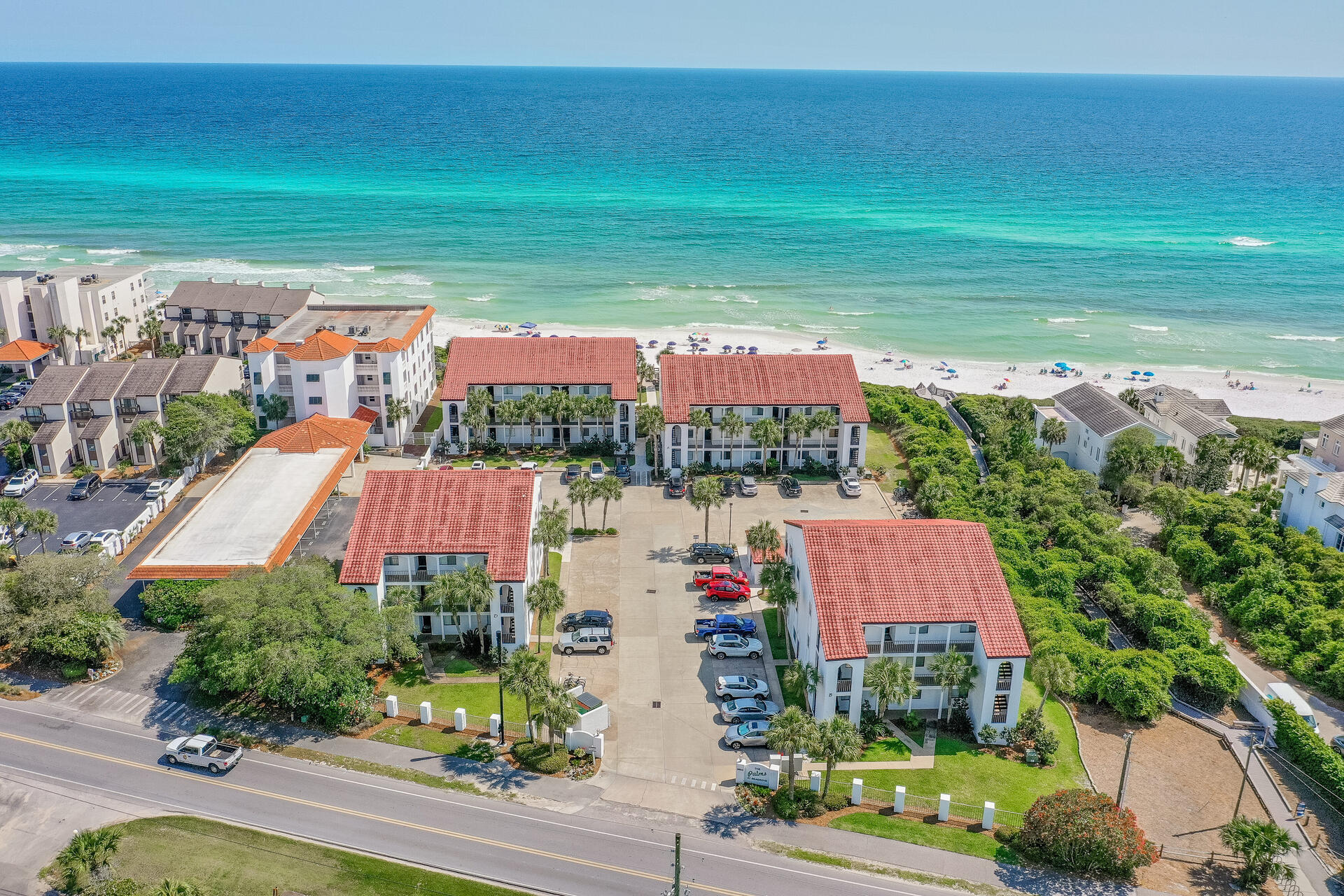 3604 East County Highway 30A, Unit B8 Santa Rosa Beach, FL 32459 - Photo 29 of 39 an aerial view of residential houses with outdoor space and parking