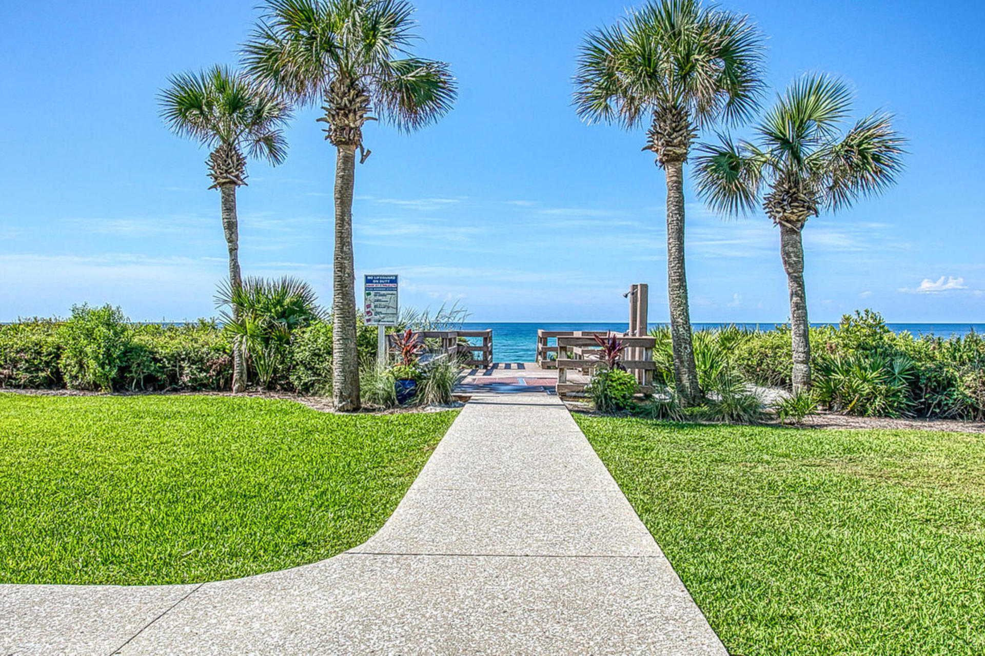 3604 East County Highway 30A, Unit B8 Santa Rosa Beach, FL 32459 - Photo 31 of 39 a view of a yard with palm trees