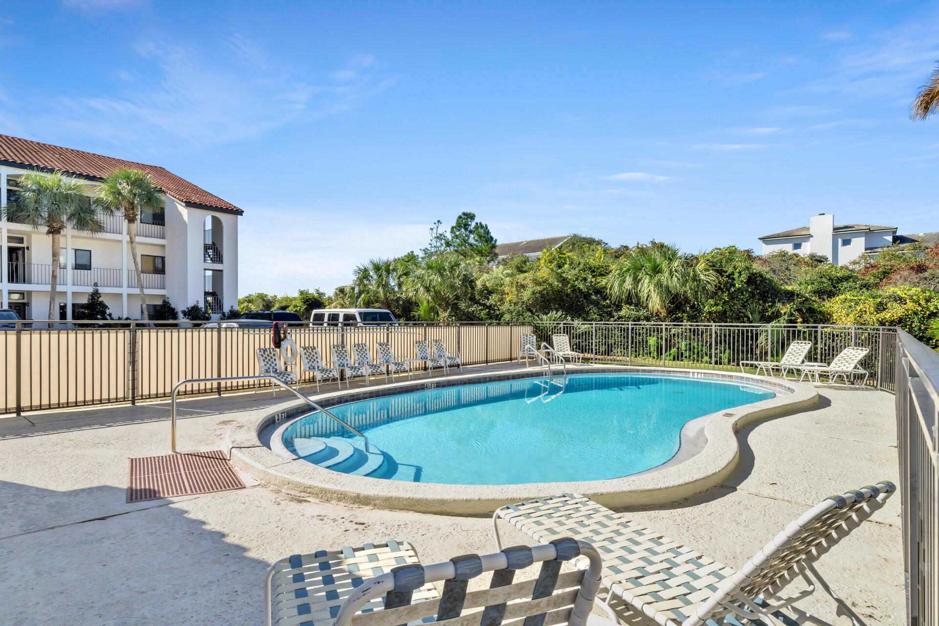 3604 East County Highway 30A, Unit B8 Santa Rosa Beach, FL 32459 - Photo 39 of 39 a view of a swimming pool with a lounge chair