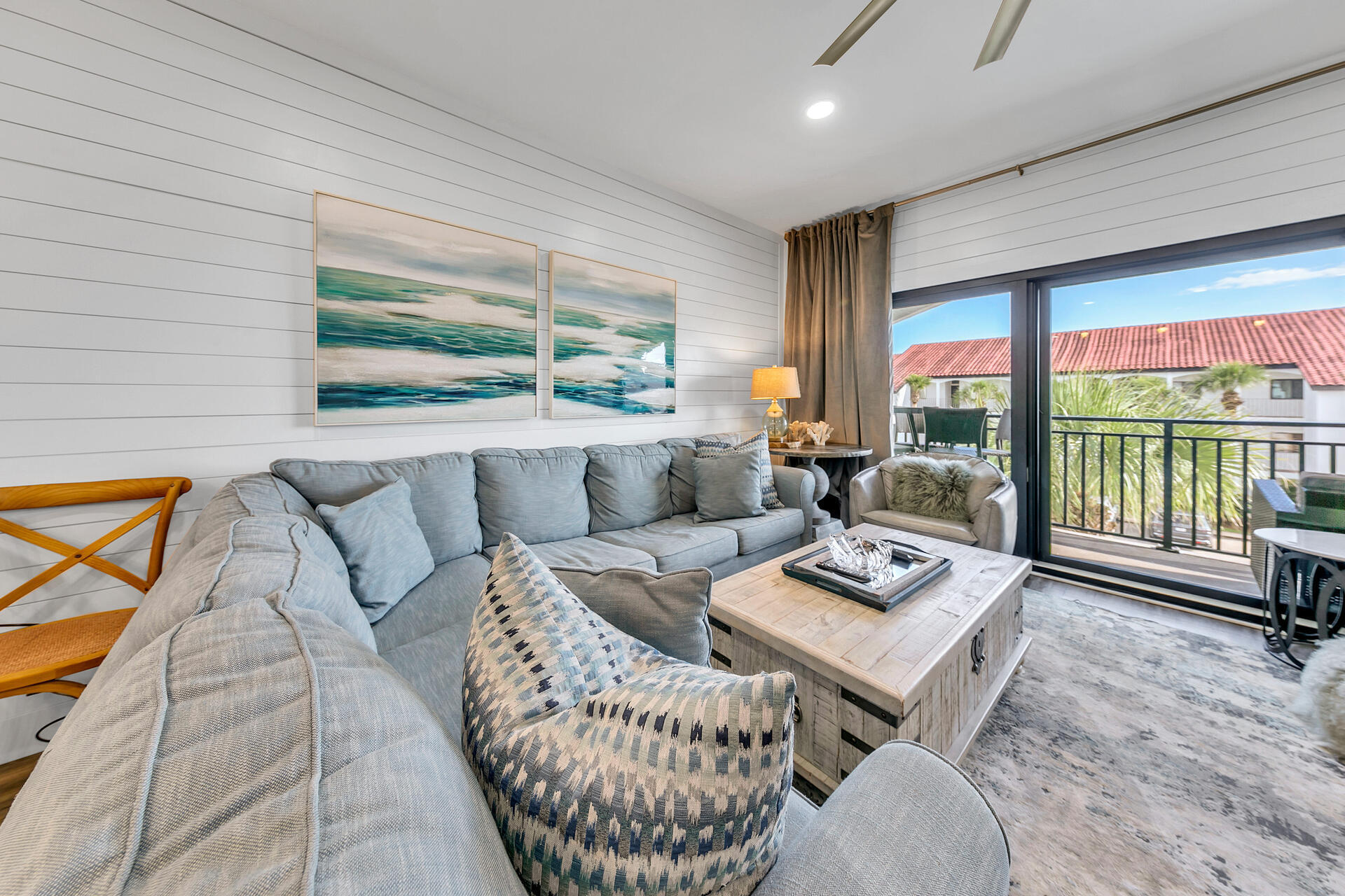 3604 East County Highway 30A, Unit B8 Santa Rosa Beach, FL 32459 - Photo 7 of 39 a living room with furniture and a floor to ceiling window