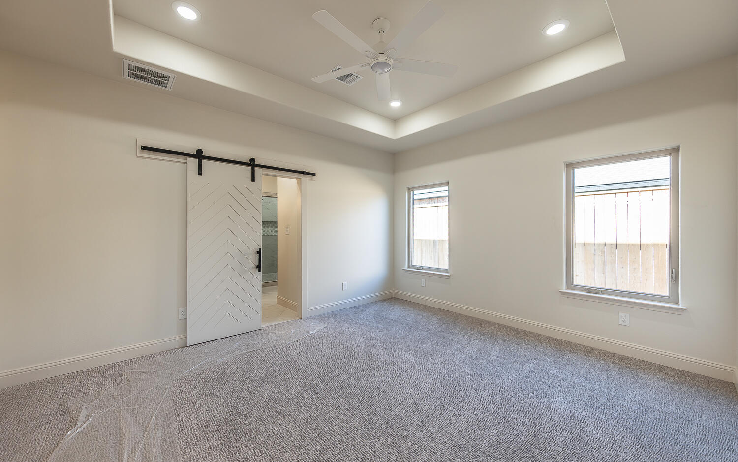 3605 143rd Street Lubbock, TX 79423 - Photo 14 of 34 a view of an empty room with a window