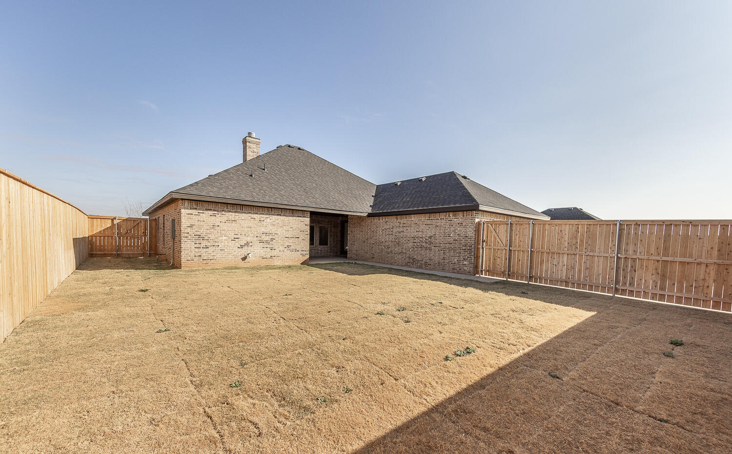 3605 143rd Street Lubbock, TX 79423 - Photo 32 of 34 a house view with wooden fence