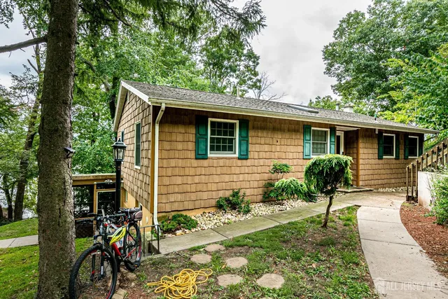 a house view with a garden space