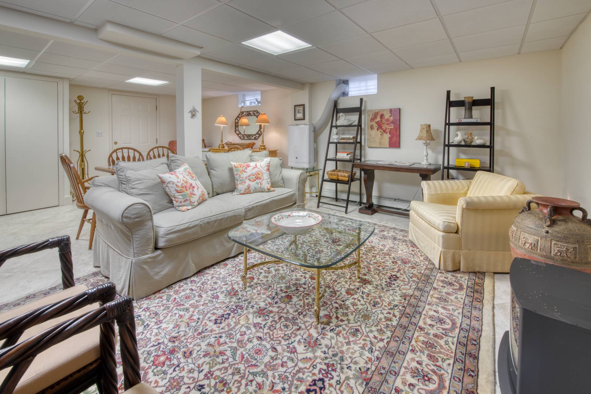 11 Maidstone Avenue East Hampton, NY 11937 - Photo 12 of 15 a living room with furniture and a wooden floor