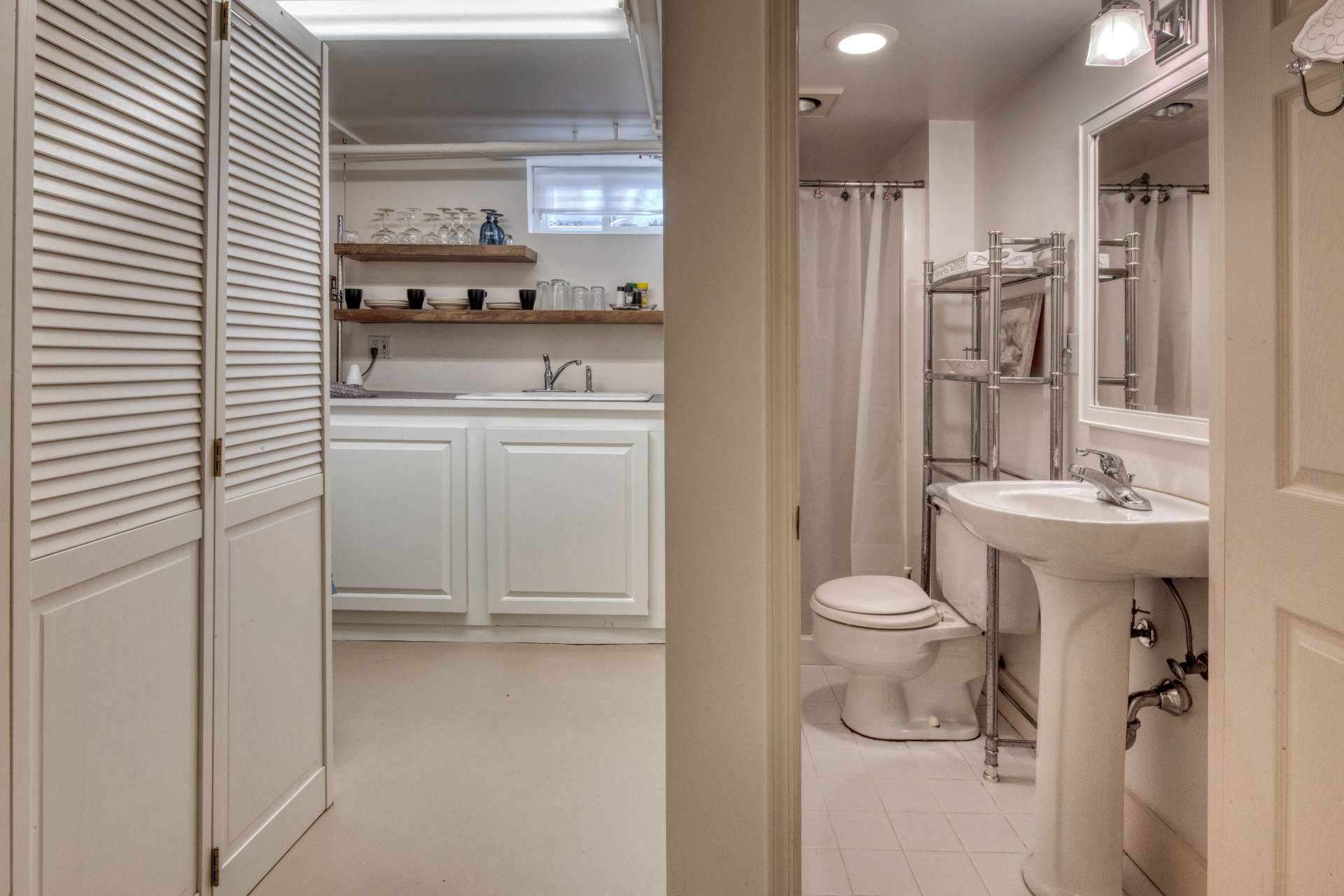 11 Maidstone Avenue East Hampton, NY 11937 - Photo 13 of 15 a bathroom with a sink toilet and shower