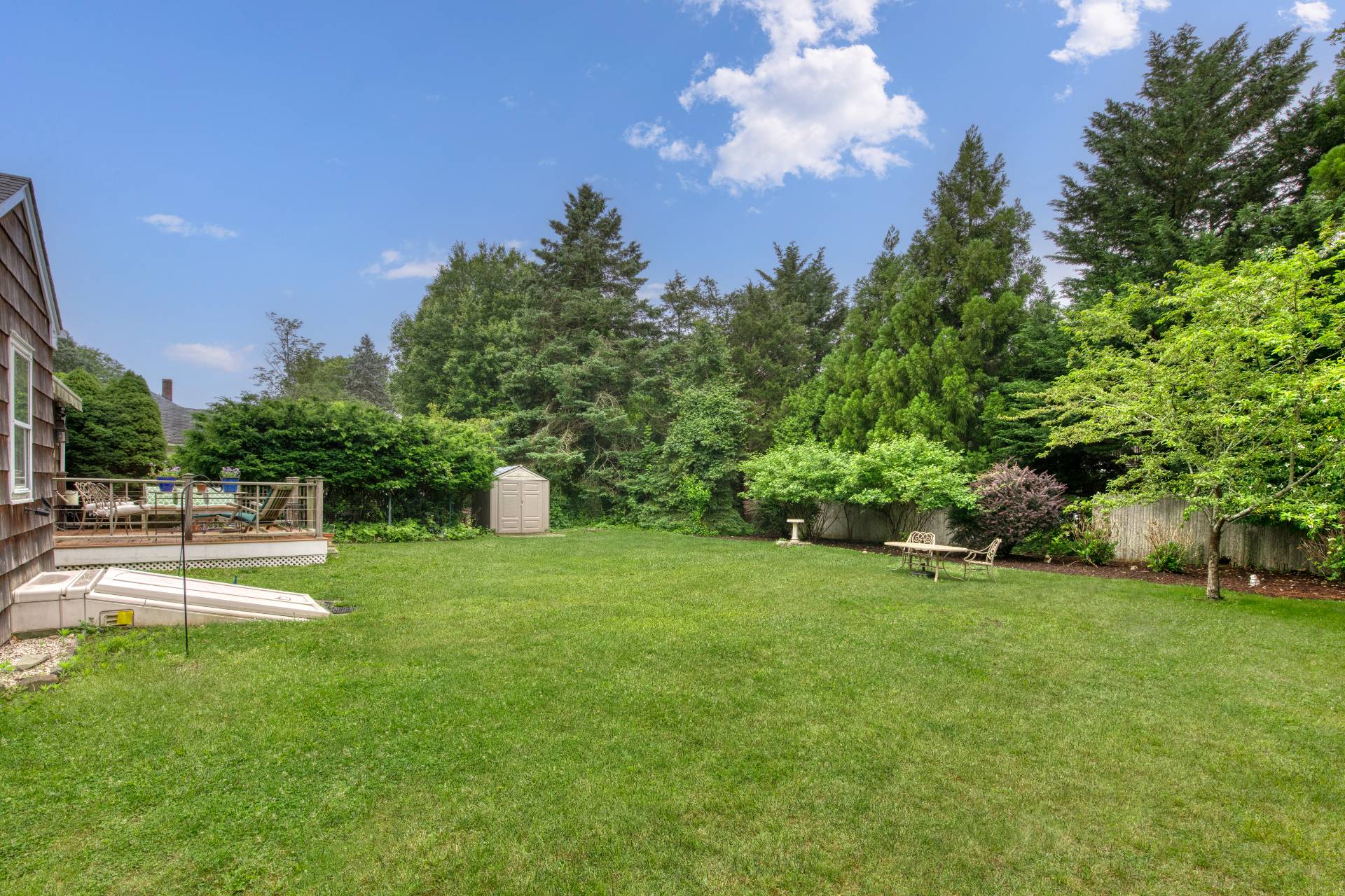 11 Maidstone Avenue East Hampton, NY 11937 - Photo 3 of 15 a house view with a garden space