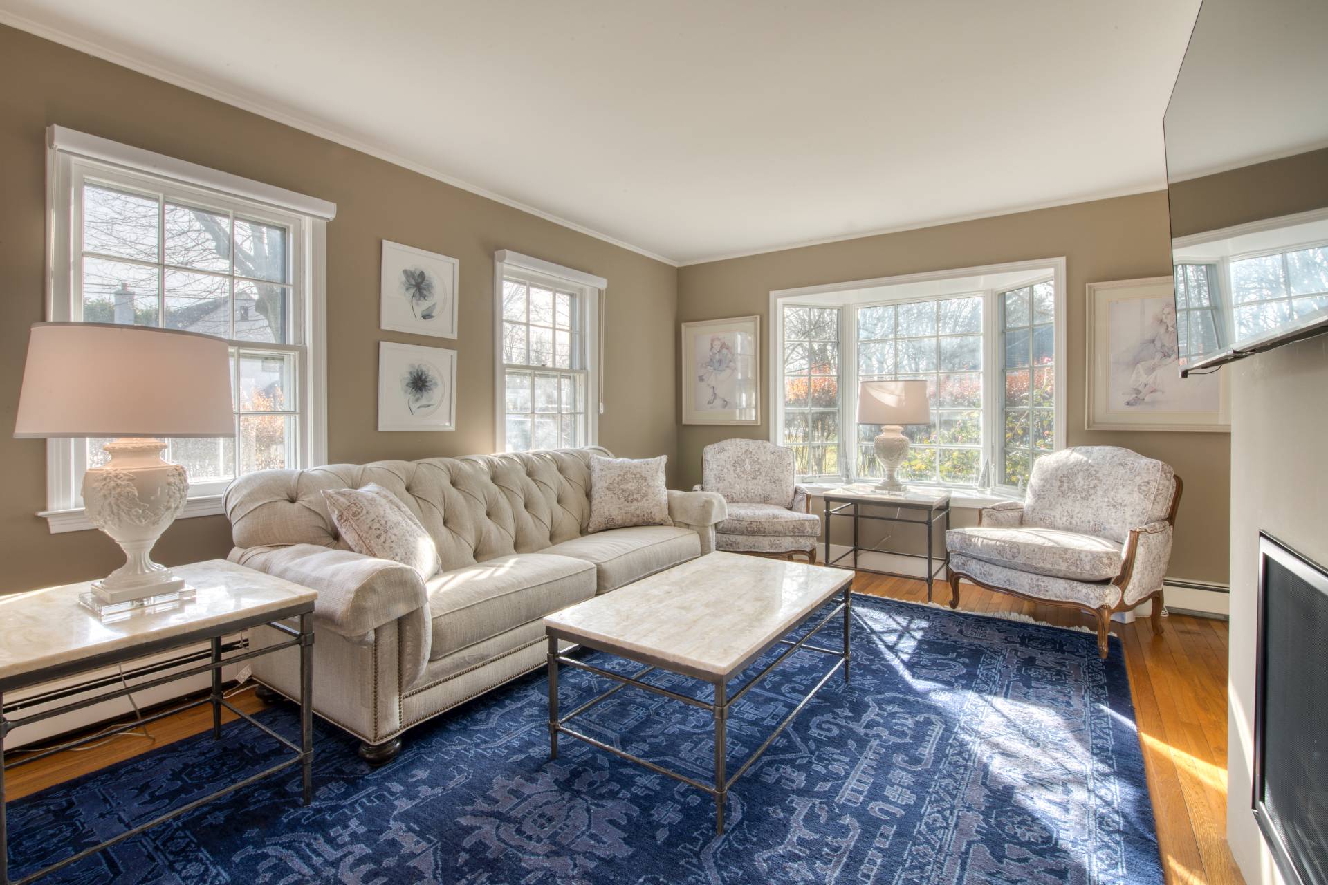 11 Maidstone Avenue East Hampton, NY 11937 - Photo 6 of 15 a living room with furniture wooden floor and a large window