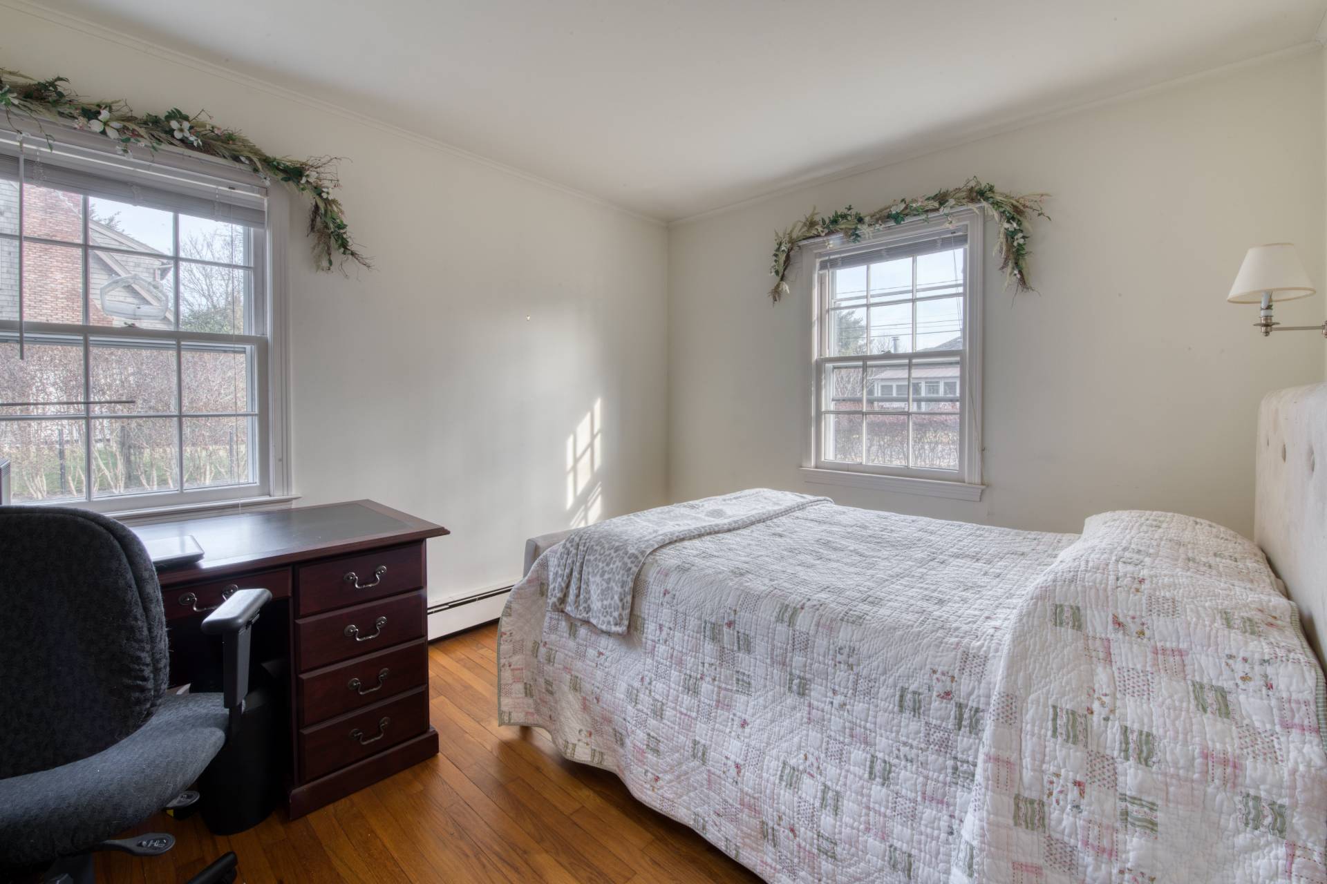 11 Maidstone Avenue East Hampton, NY 11937 - Photo 9 of 15 a bedroom with a bed and a window