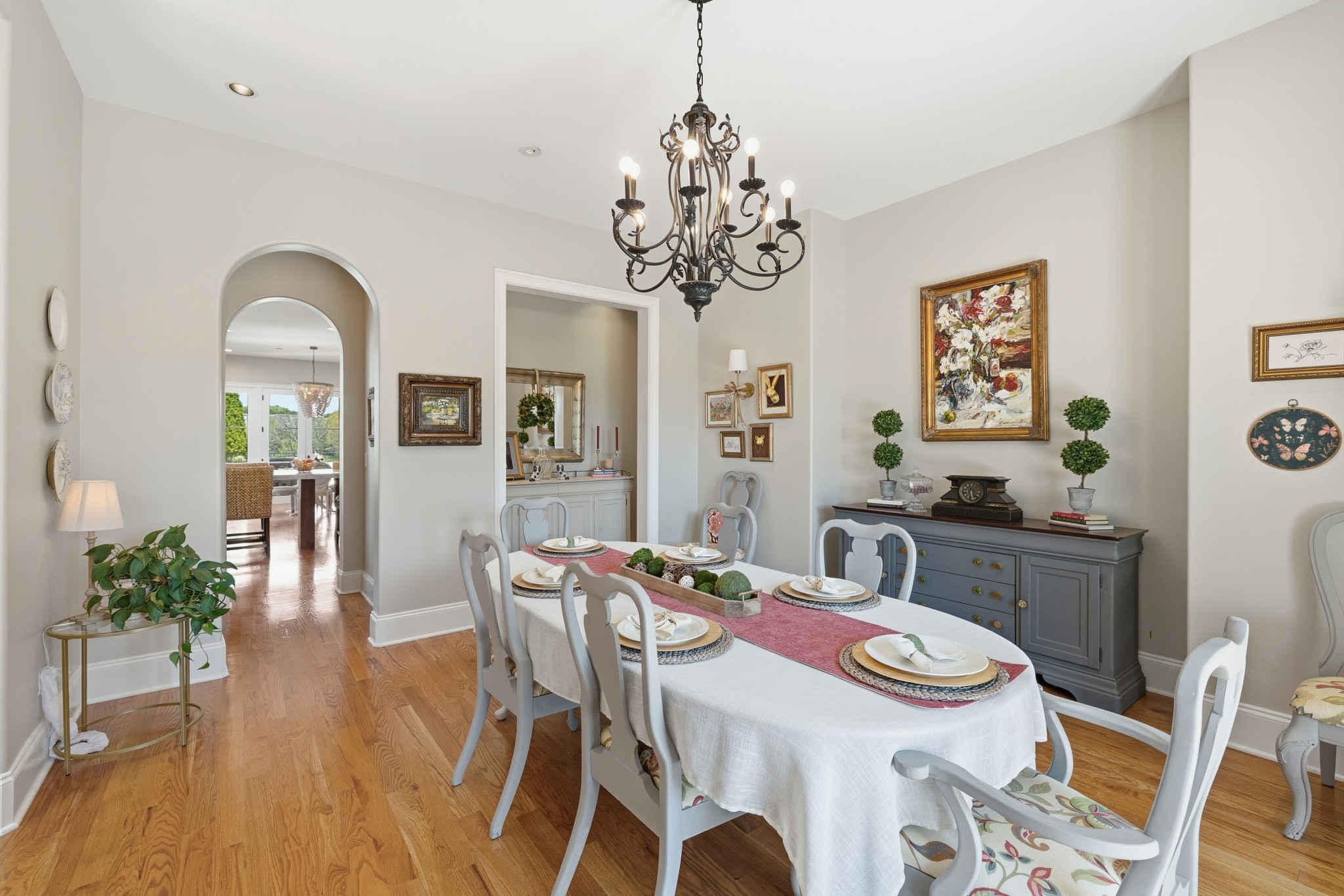 4606 Shores Road Murfreesboro, TN 37128 - Photo 11 of 74 a view of a dining room with furniture wooden floor and chandelier