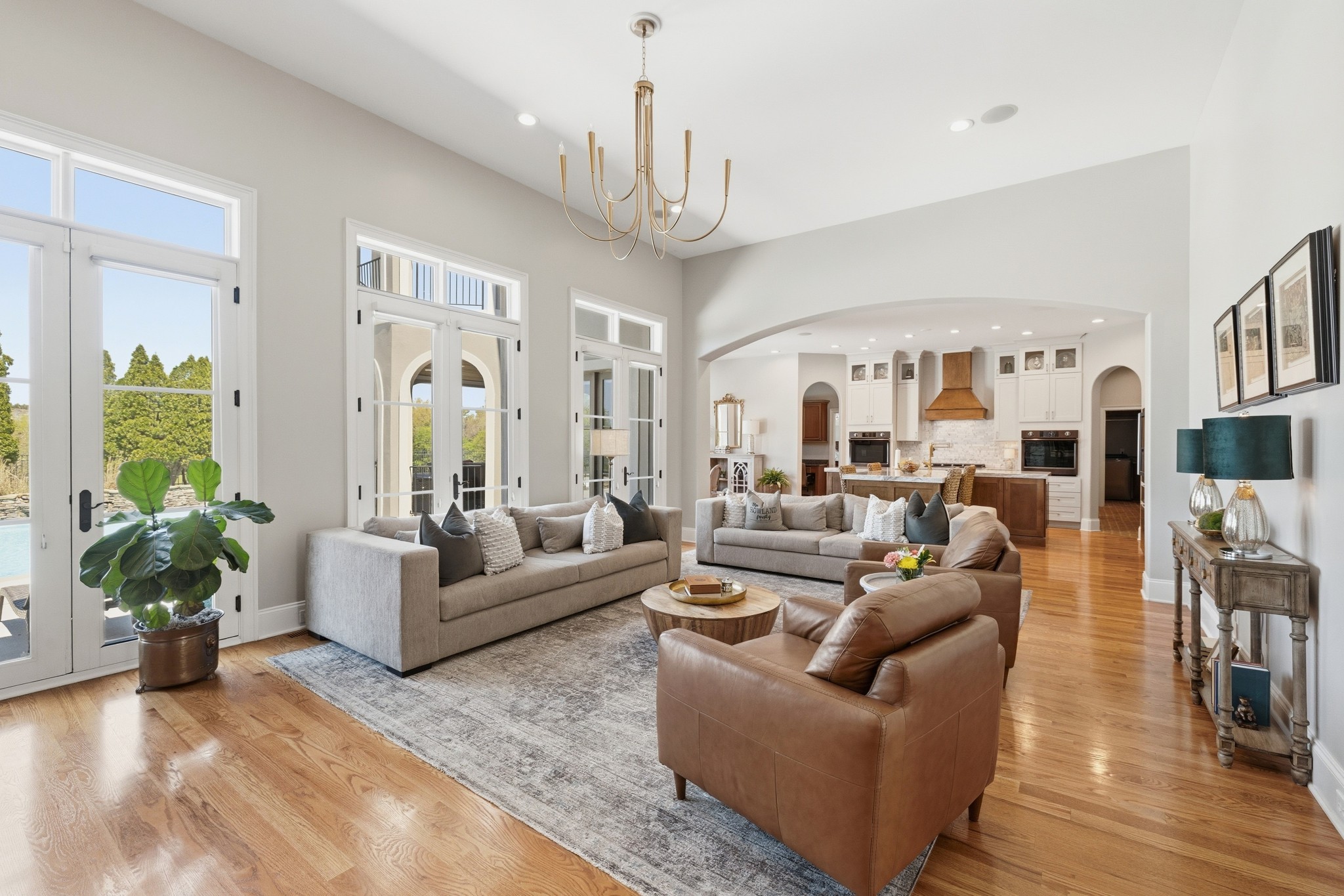 4606 Shores Road Murfreesboro, TN 37128 - Photo 13 of 74 a living room with furniture a chandelier and a chandelier