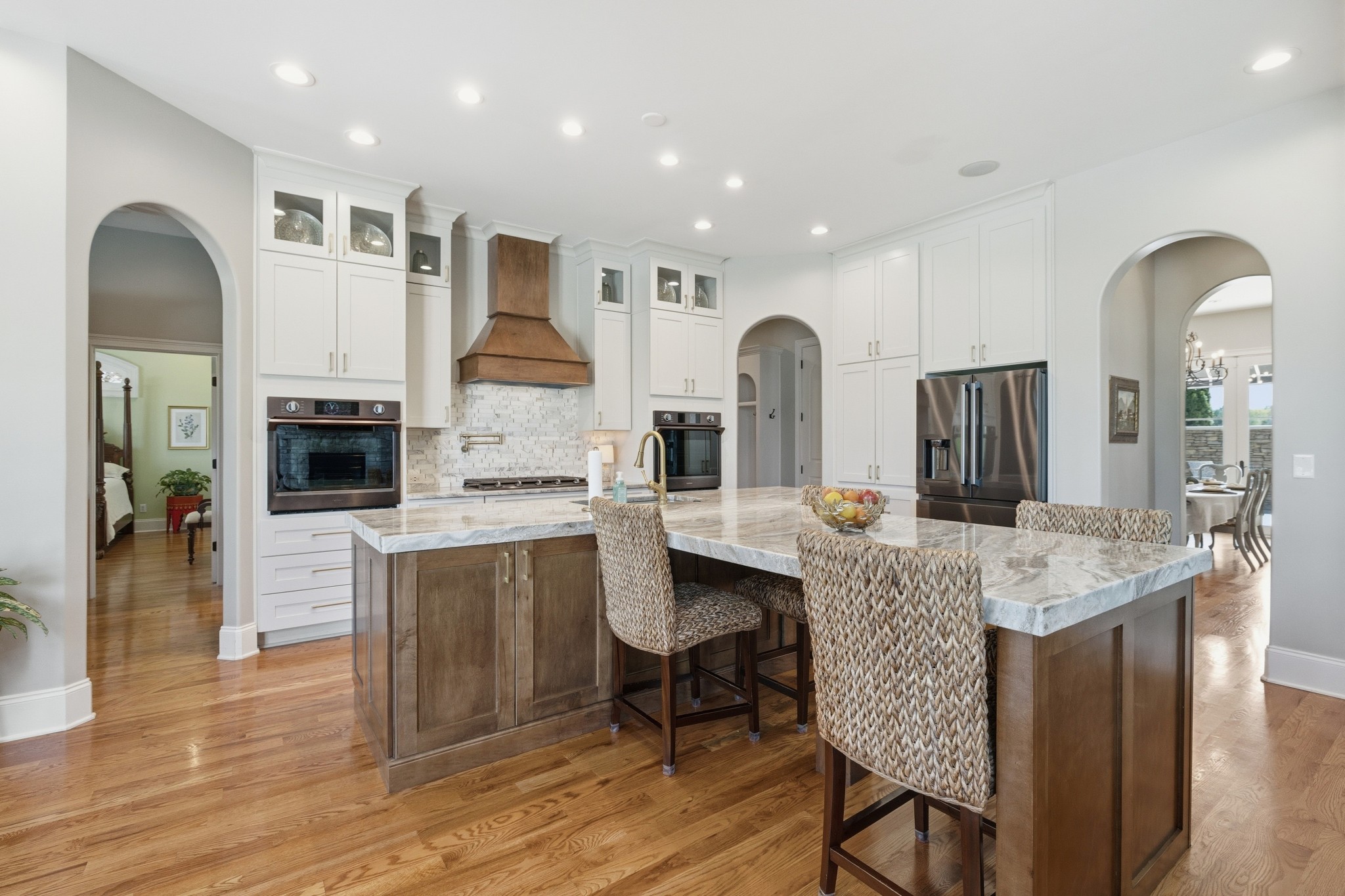4606 Shores Road Murfreesboro, TN 37128 - Photo 17 of 74 a dining hall with stainless steel appliances kitchen island a table and chairs