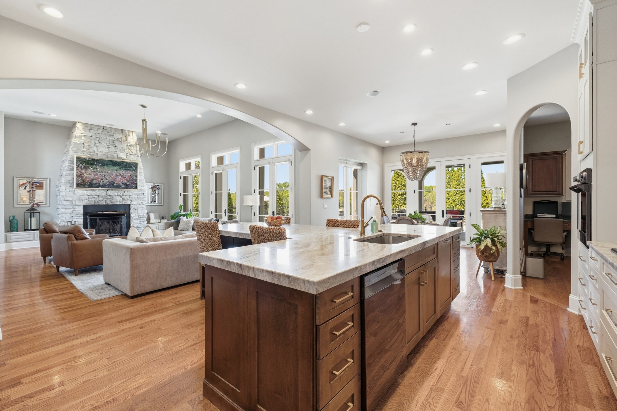 4606 Shores Road Murfreesboro, TN 37128 - Photo 18 of 74 a large kitchen with stainless steel appliances granite countertop a lot of counter space and wooden floor