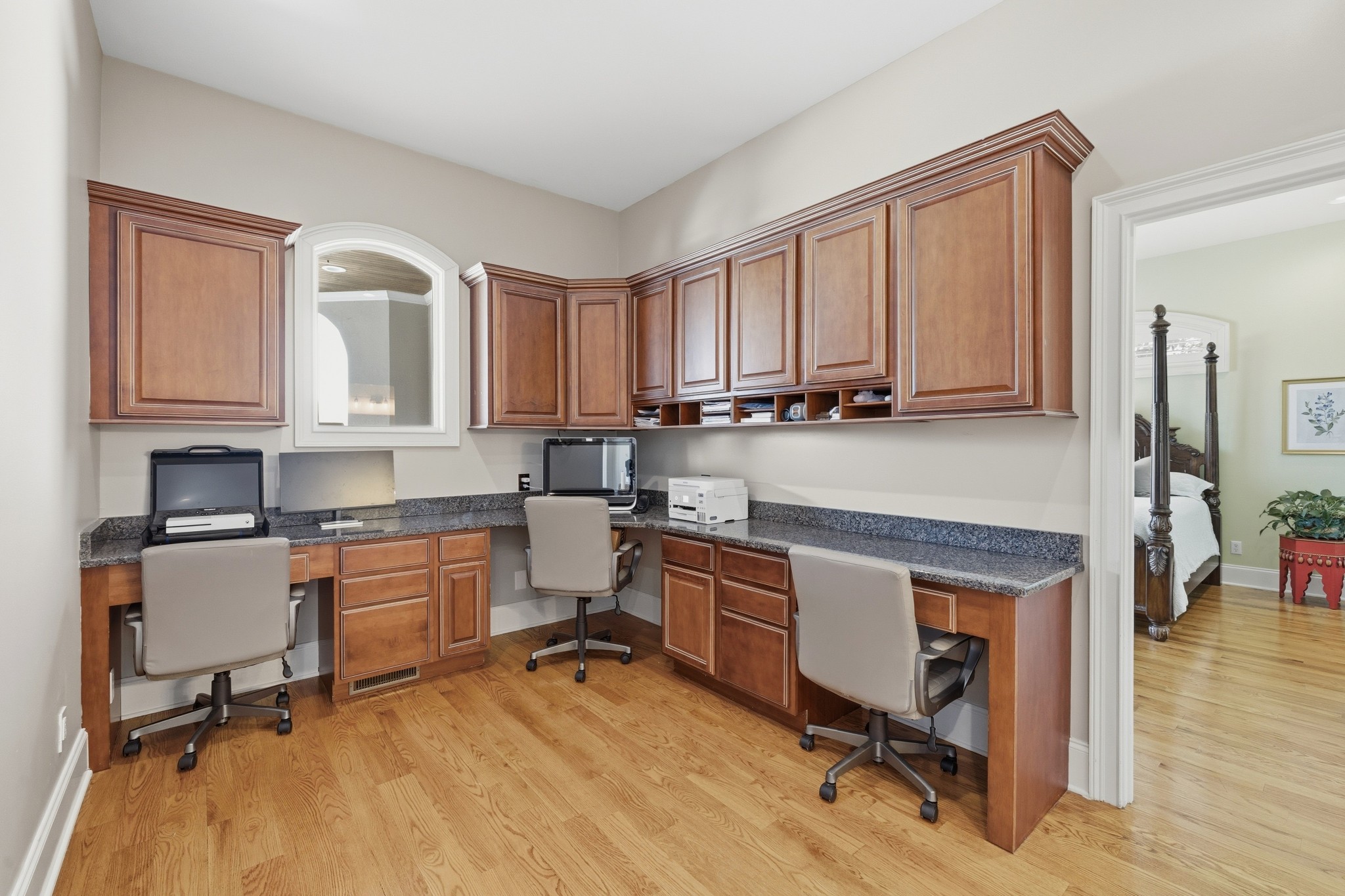 4606 Shores Road Murfreesboro, TN 37128 - Photo 23 of 74 a room with stainless steel appliances wooden floors and furniture