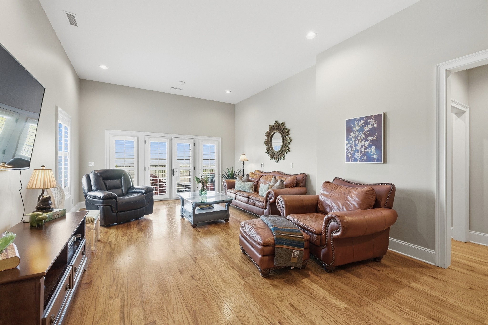 4606 Shores Road Murfreesboro, TN 37128 - Photo 36 of 74 a living room with furniture and a wooden floor