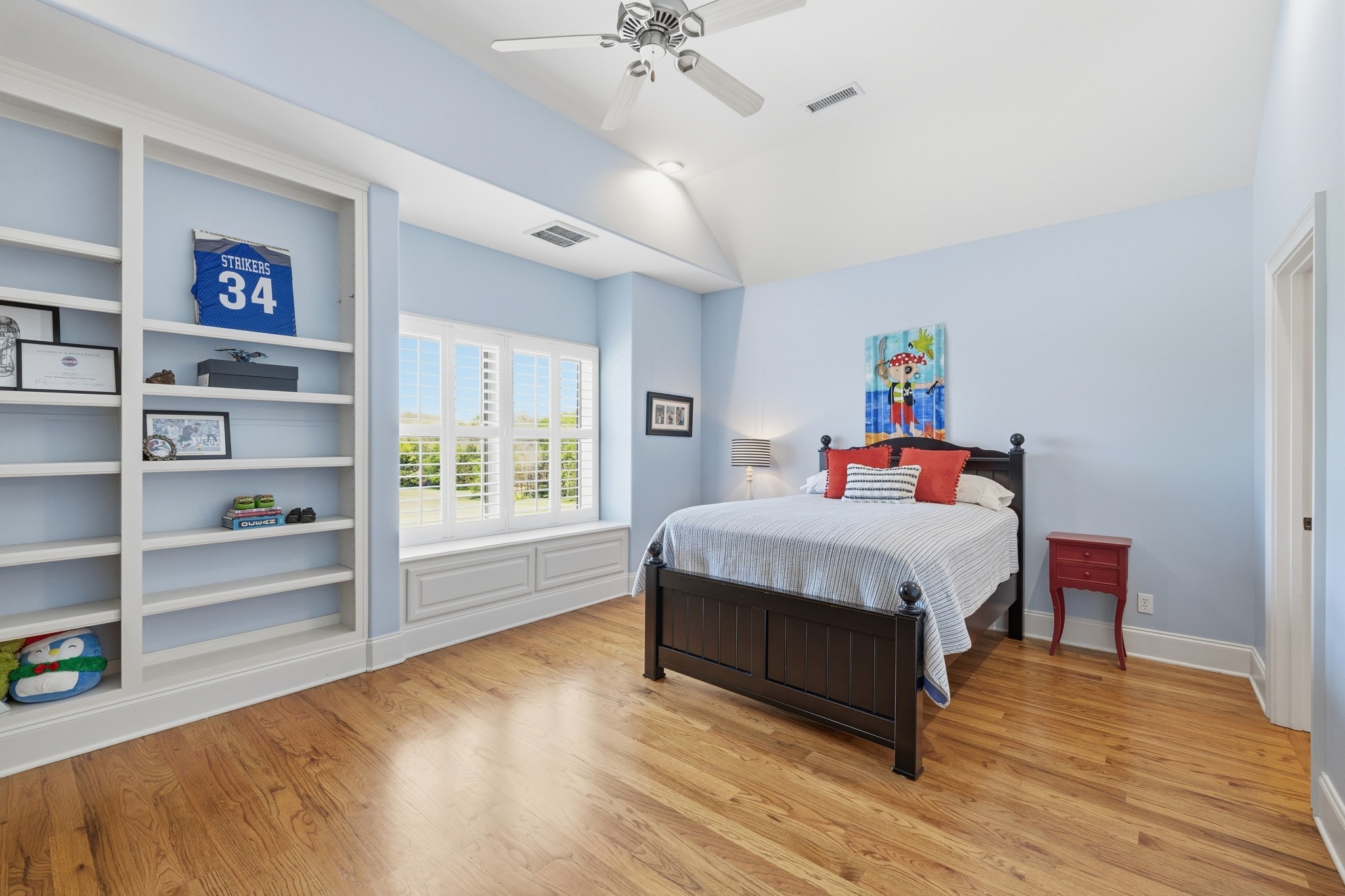 4606 Shores Road Murfreesboro, TN 37128 - Photo 38 of 74 a bedroom with a bed and a book shelf