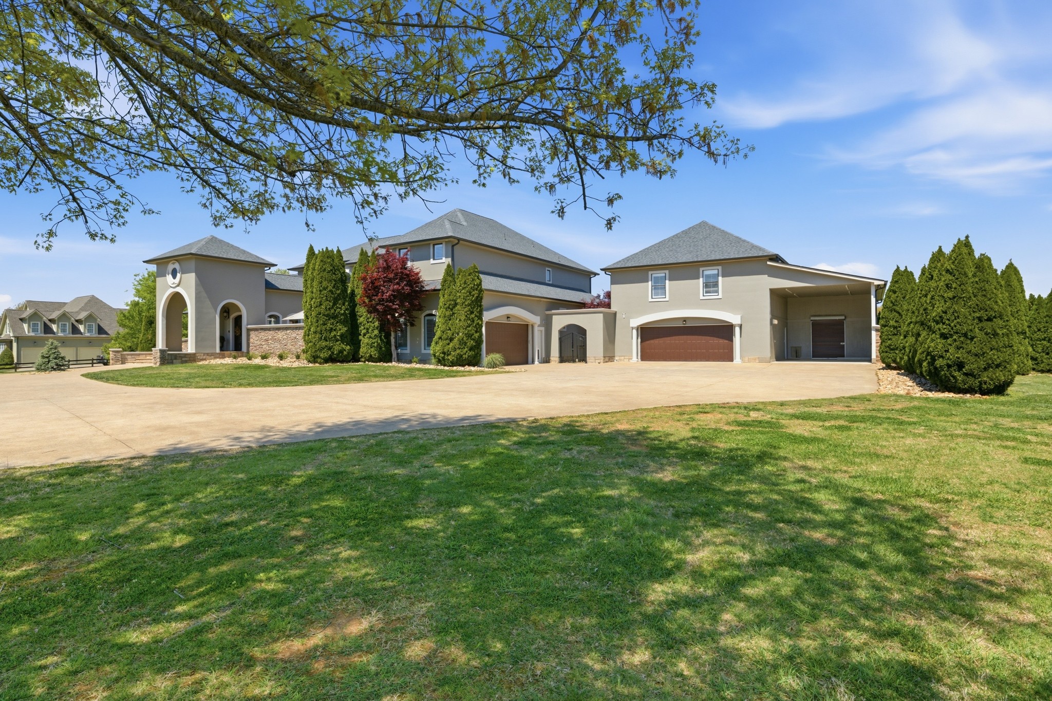 4606 Shores Road Murfreesboro, TN 37128 - Photo 4 of 74 a front view of a house with a yard
