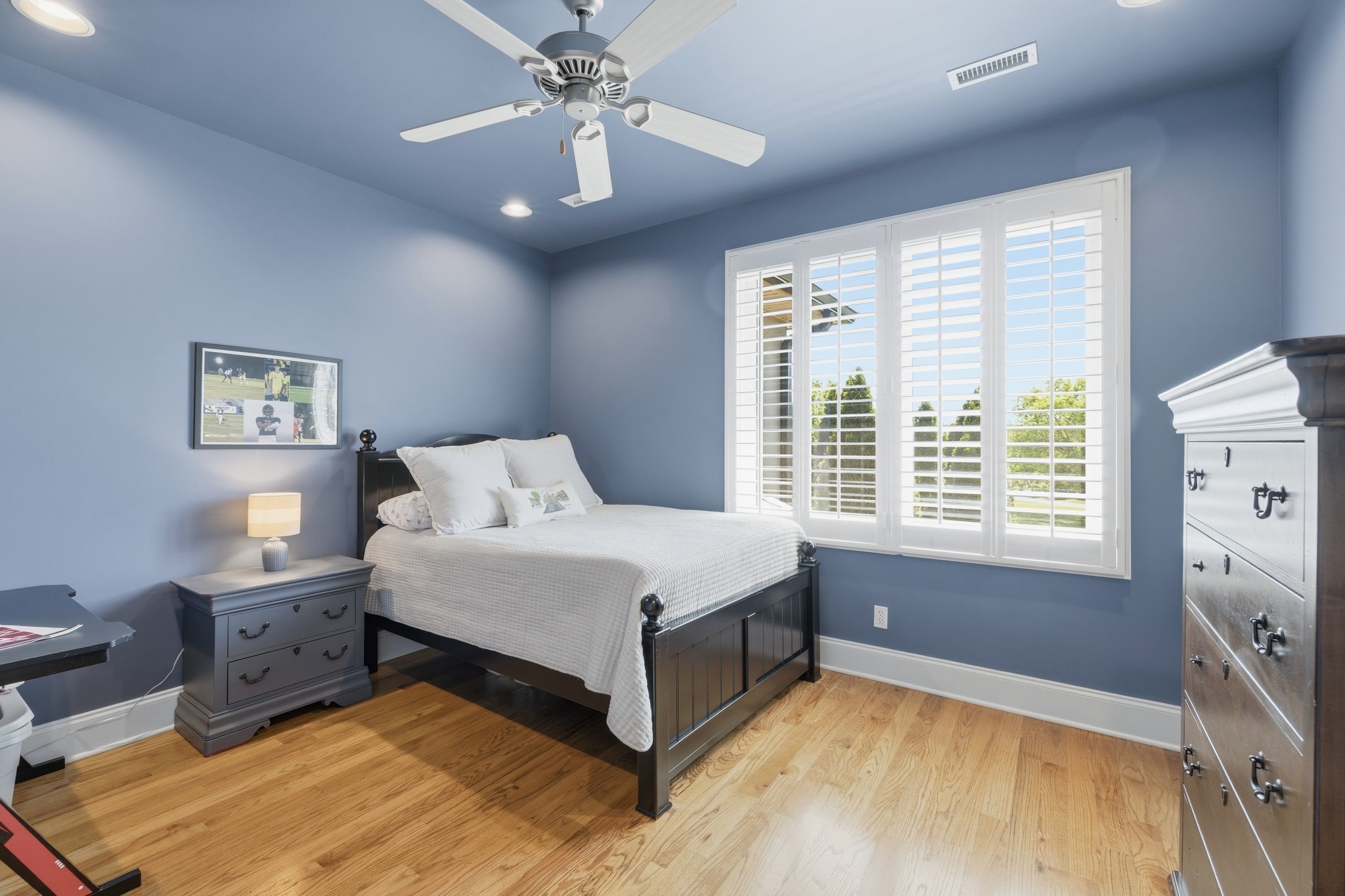 4606 Shores Road Murfreesboro, TN 37128 - Photo 42 of 74 a spacious bedroom with a bed and a chandelier