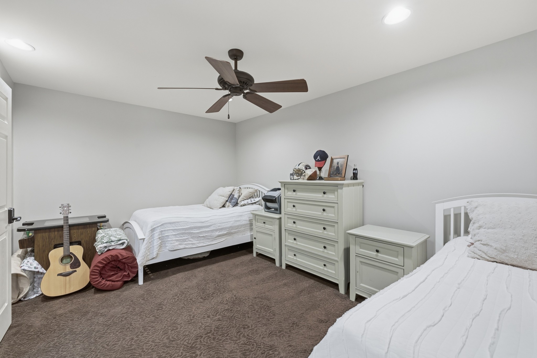 4606 Shores Road Murfreesboro, TN 37128 - Photo 46 of 74 a bedroom with a bed and a chandelier