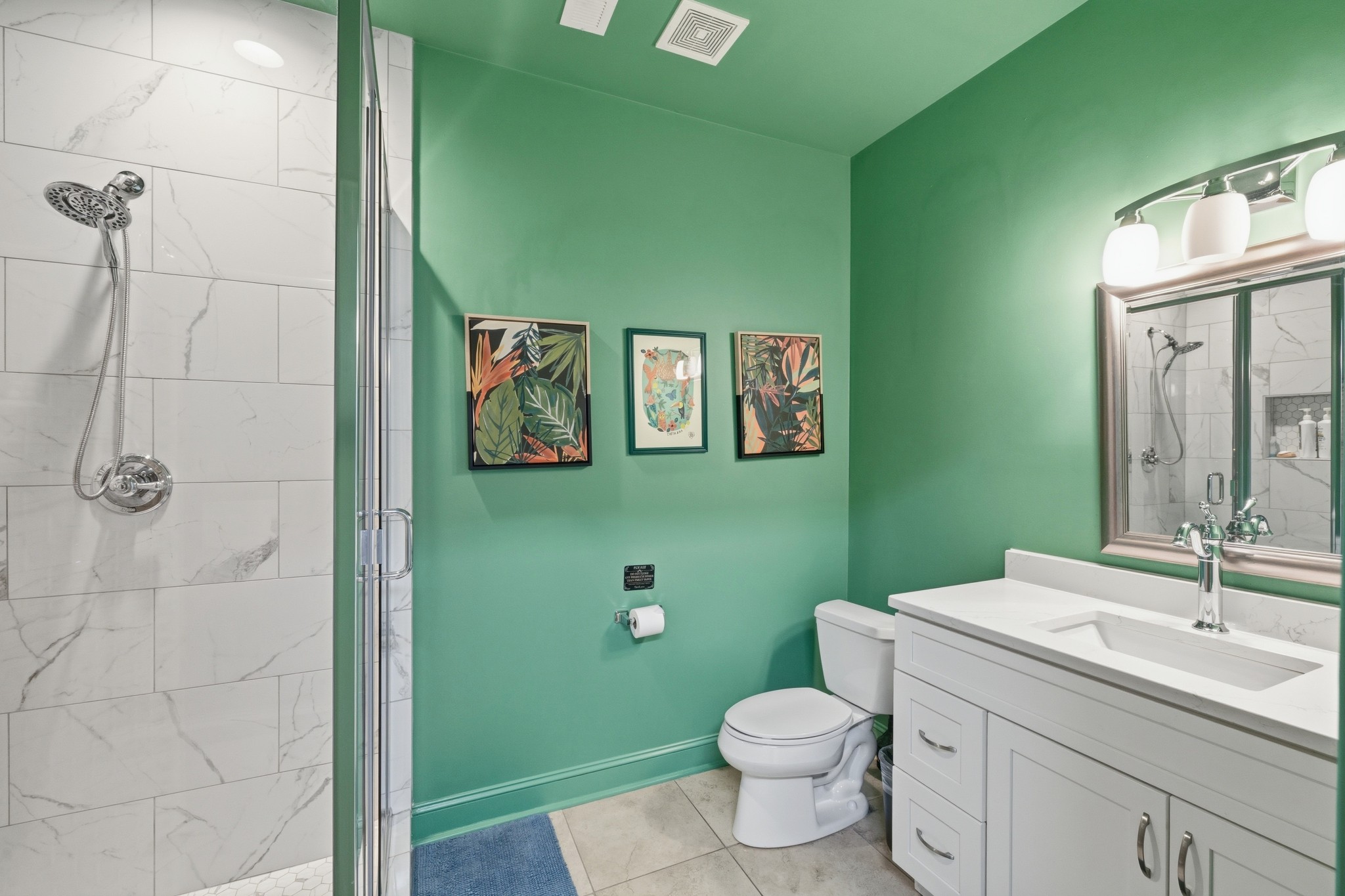 4606 Shores Road Murfreesboro, TN 37128 - Photo 51 of 74 a bathroom with a toilet sink and mirror