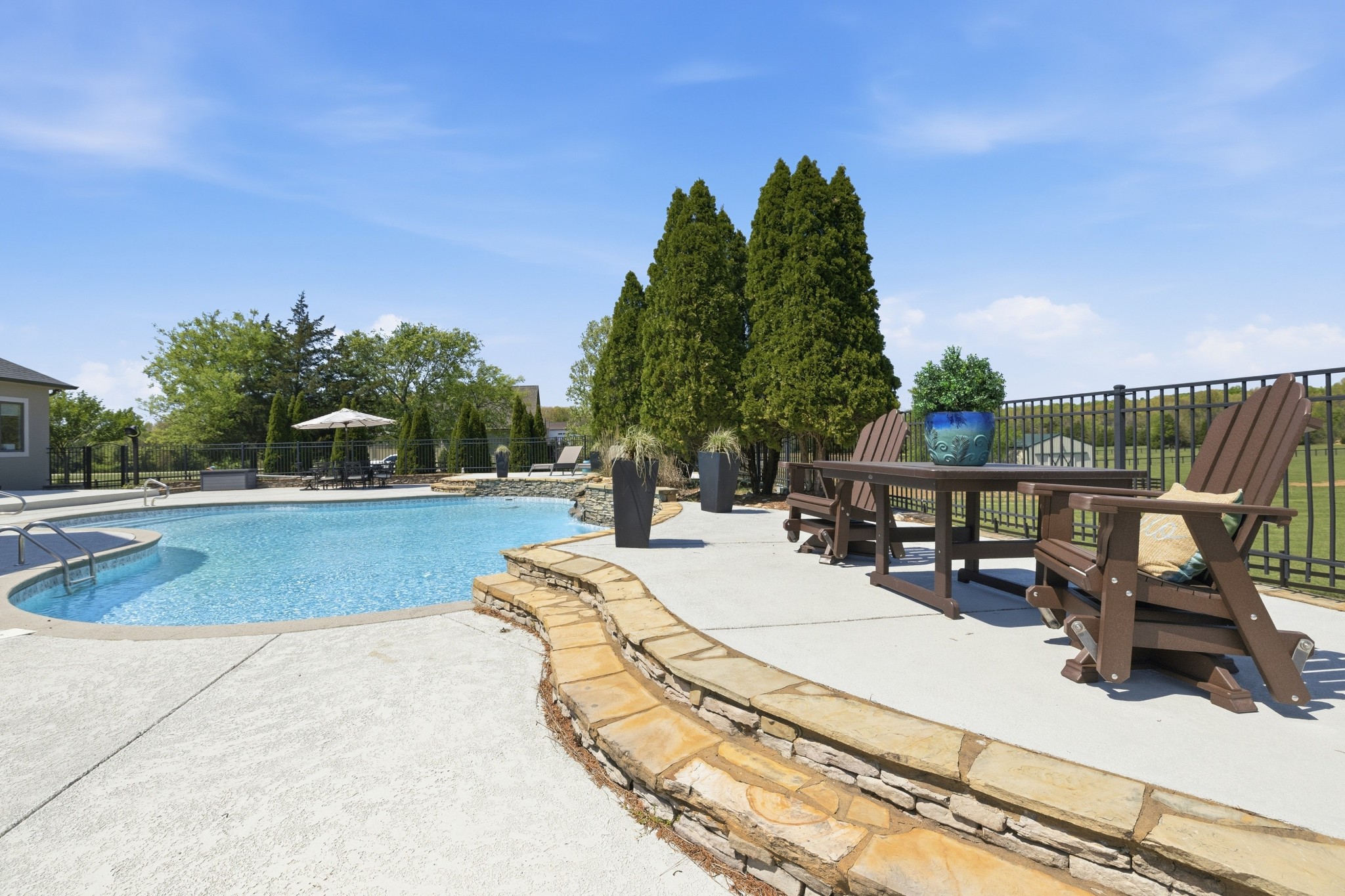 4606 Shores Road Murfreesboro, TN 37128 - Photo 55 of 74 a view of a swimming pool with a lounge chair
